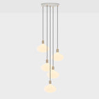 Cinq pendentifs en laiton + ovale II