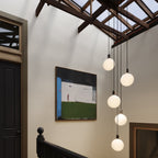 Cinq pendentifs en laiton + sphère V