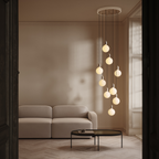 Neuf pendentifs en laiton + sphère IV